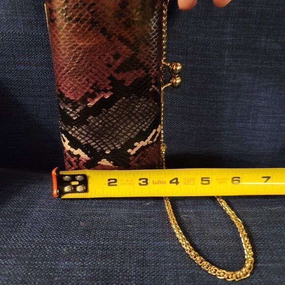 00000000_zi_471986fe-26ca-46fe  Dune of London Snakeskin Effect Etched Clasp Clutch